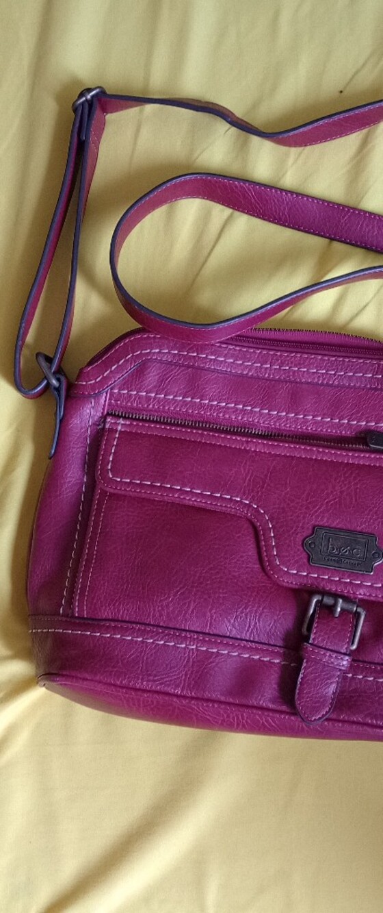B.O.C Born Concepts burgundy faux leather crossbody bag with a front buckle deta